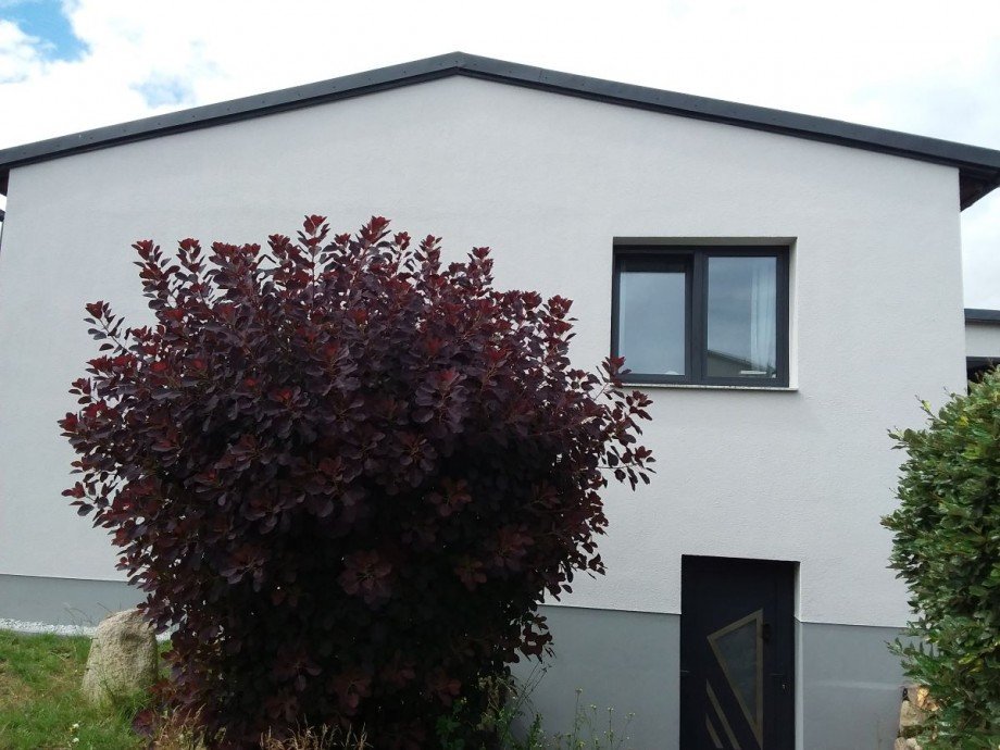 Seitenansicht rechts - Eingang UG Einfamilienhaus Mallentin