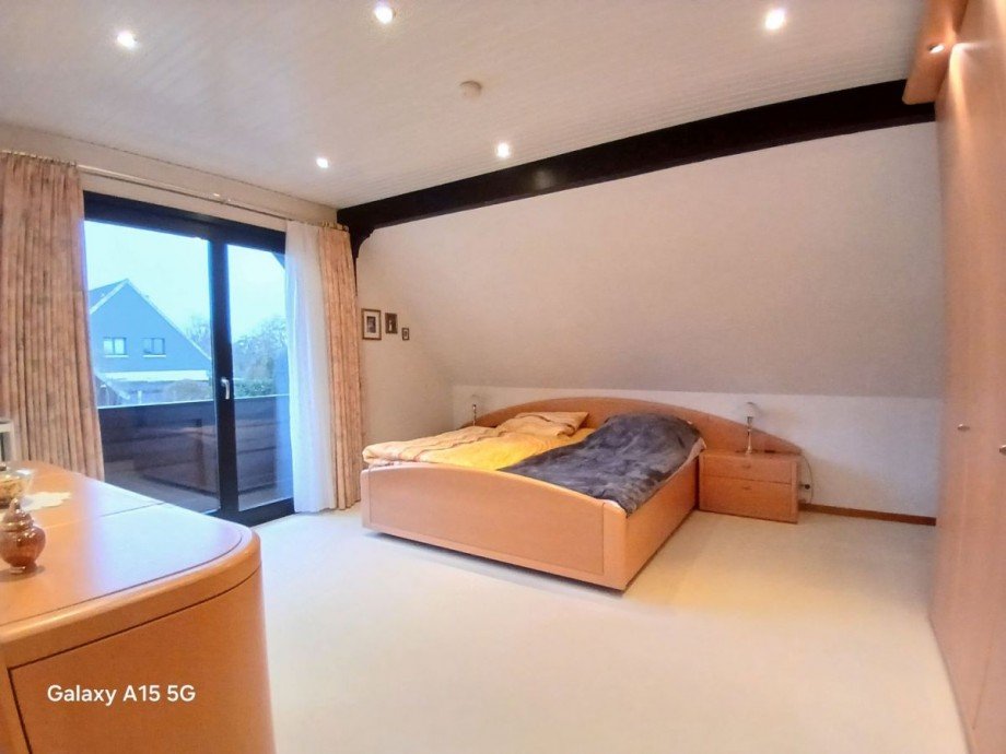 Schlafzimmer mit Balkon - DG Einfamilienhaus Stockelsdorf